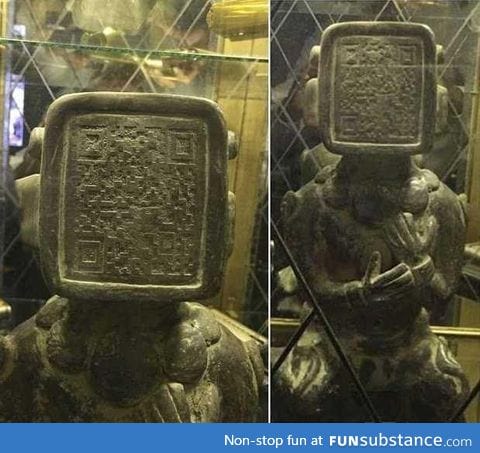 Ancient Mayan statue has QR code on its face