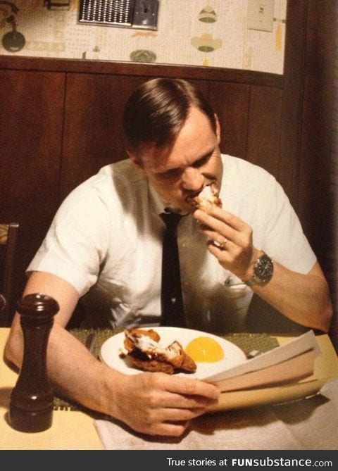 Neil Armstrong eating his last breakfast on Earth before leaving for the moon - 1969