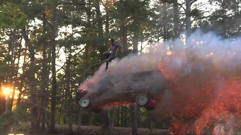This crazy guy jumps out of burning truck as it crashes into a pond