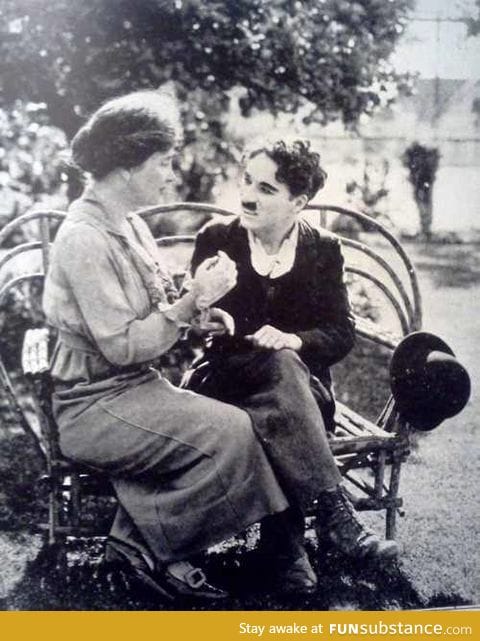 Helen Keller teaching Charlie Chaplin sign language
