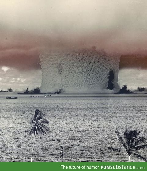 Massive column of water rises from the ocean as an Atomic Bomb detonates at Bikini Atoll