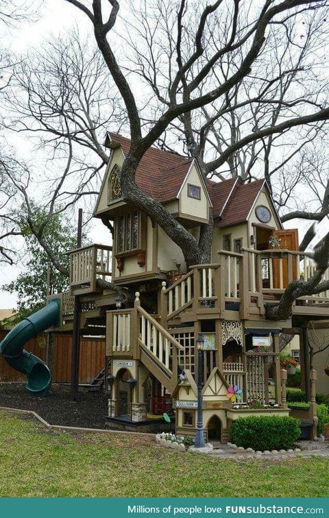 Describe this backyard treehouse in one word