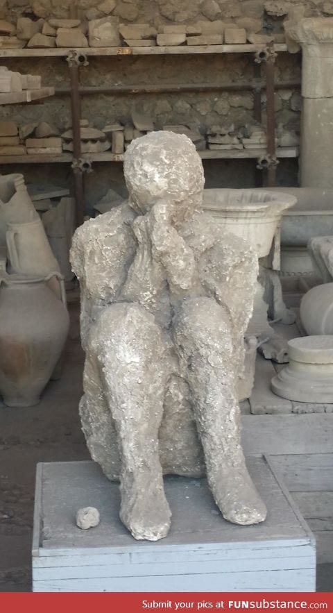 Man trying to cover his face, Pompeii