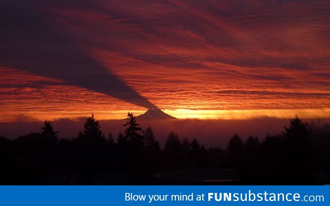 Mount Ranier Casting a Shadow in the Clouds