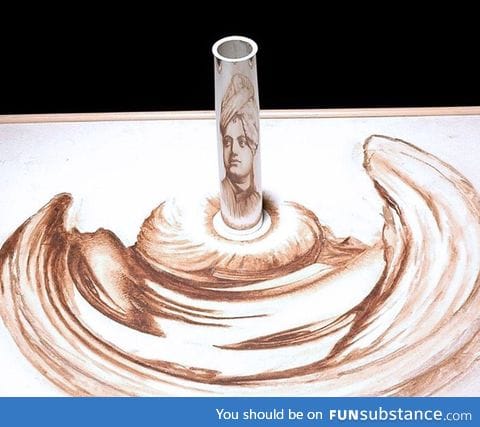 Stunning anamorphic artwork that can only be seen with a mirror cylinder
