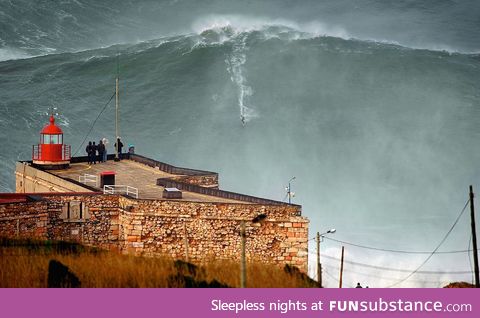 Garrett McNamara surfs Big Mama, Nazaré, Portugal