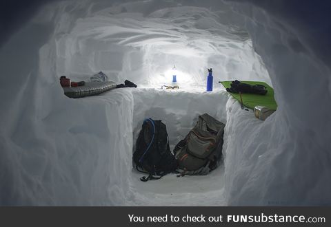 Snow cave camping setting