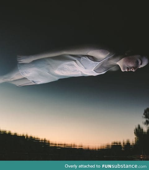 Floating in a lake at sunset