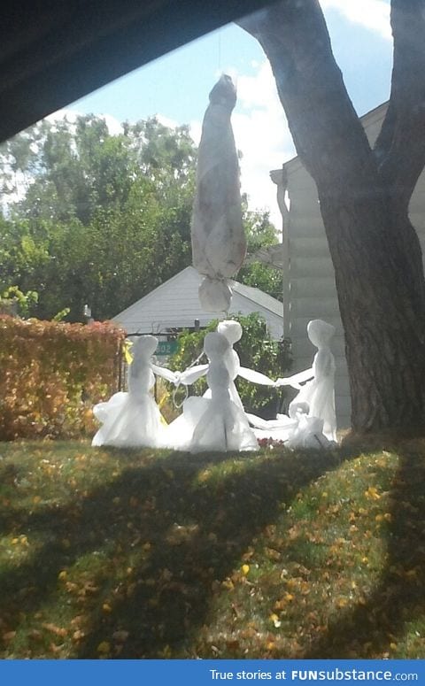 "My neighbors creepy Halloween setup"