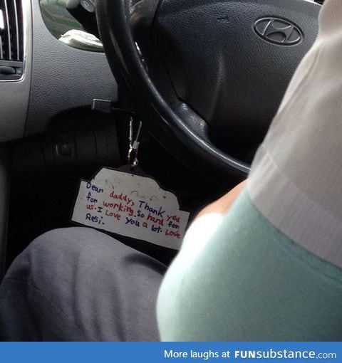 A note hanging from this taxi driver's steering wheel