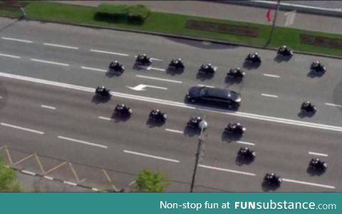 Has anyone seen putins car being flanked by the police in australia.