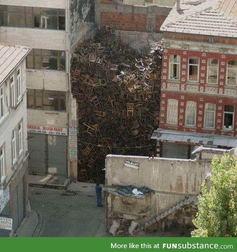 These chairs in between two buildings