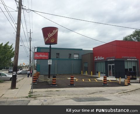 This Tim Hortons turned an old KFC bucket sign into a giant coffee cup