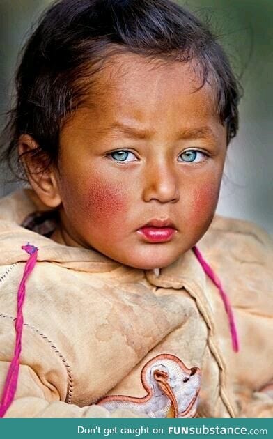 beautiful blue eyed boy from nepal