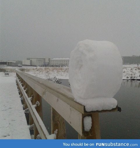 The wind naturally curled this snow into a roll