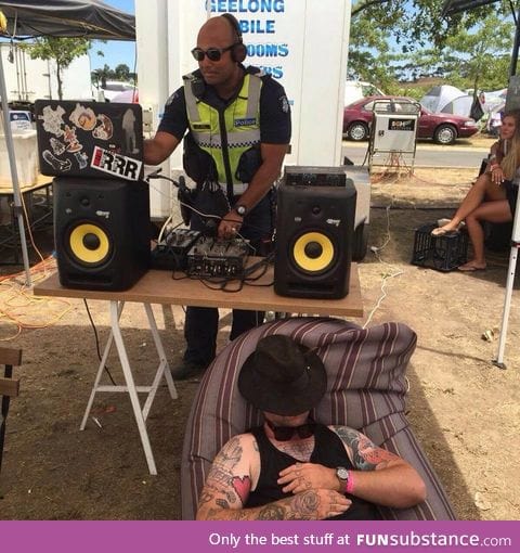 Policeman replacing the asleep DJ at Falls Festival, Australia