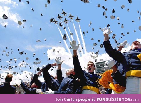 Horrified graduates flee as planes attack them with hats