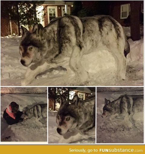 Incredible wolf snow sculpture