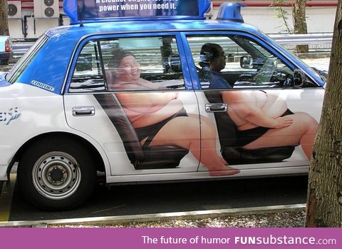 I'd love to ride this Sumo Taxi!