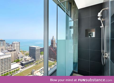 View from the shower in a condo in downtown Chicago