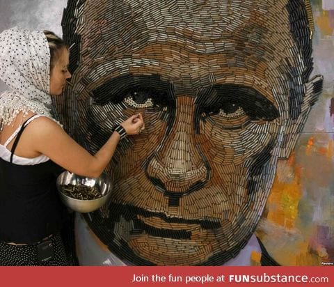 Ukranian woman making a Putin mosaic with shell casings