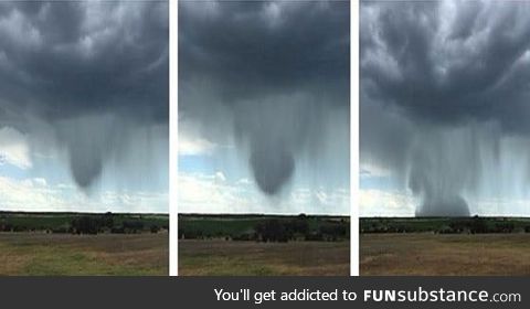 This rare "rain bomb" dropping from the sky looks incredible