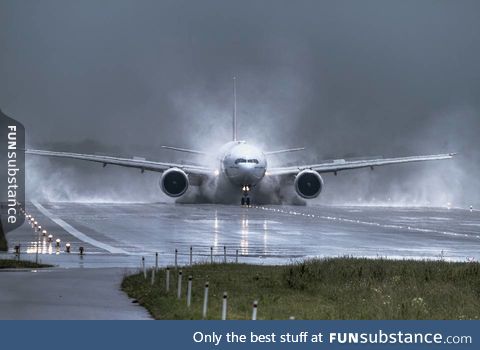 Plane landing in stormy weather