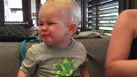 Toddler torturing himself eating sour cranberries