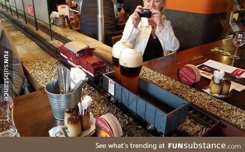 Beer at a restaurant in Prague is delivered by a miniature train