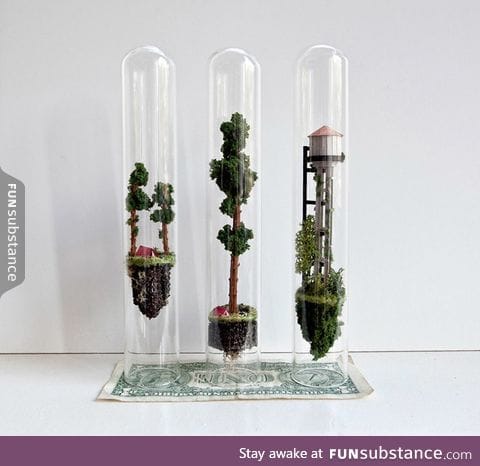 Tiny floating worlds inside glass test tubes