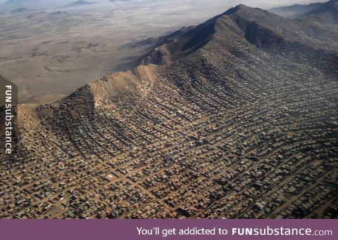 Slums crest the hill line in Kabul, Afghanistan