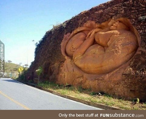 A father lost his pregnant wife to a drunk driver and carved this at the accident site