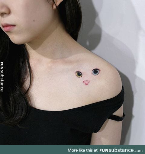 Minimalistic cat tattoo