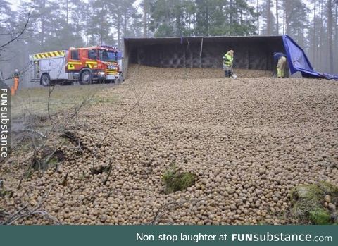 Truck transporting 20 tons of potatoes fell over