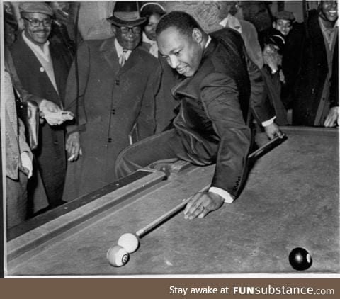 MLK shooting pool with style