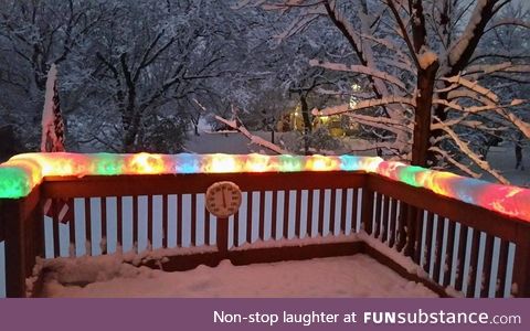 Christmas lights after a snowstorm