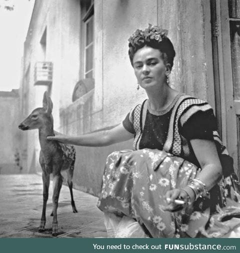 Frida Kahlo and a fawn, 1939.