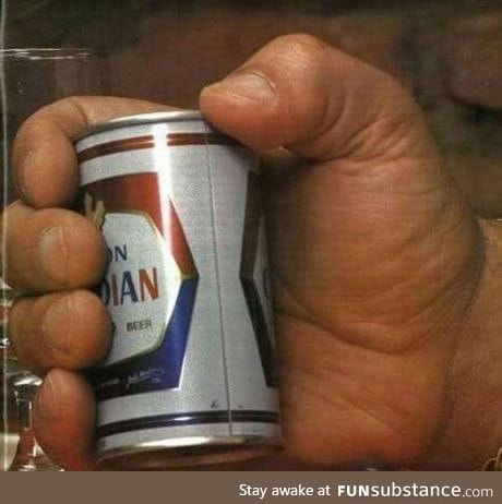 Andre The Giant holding a normal-size (355ml) beer can. Mofo once drank 156 beers