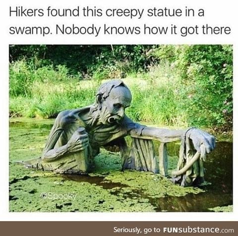 Creepy statue in a swamp