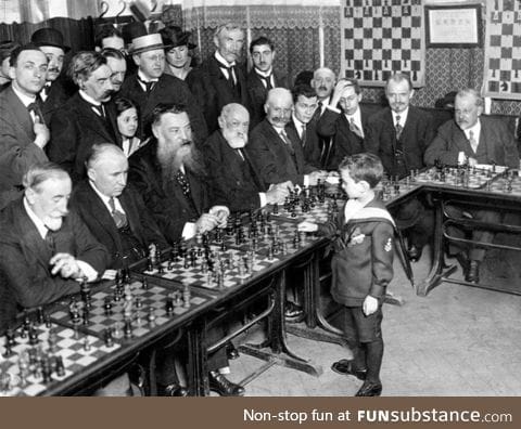 Samuel Reshevsky, age 8, defeating several chess masters at once in France, 1920