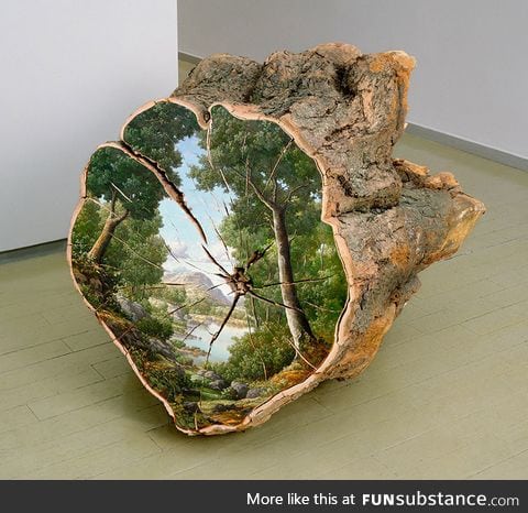 Landscape painted on fallen tree logs