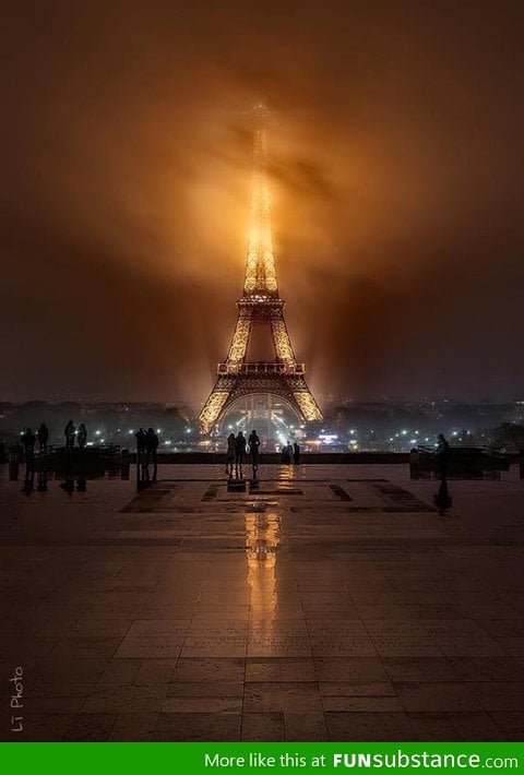 Eiffel Tower on a foggy night