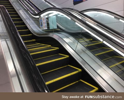 This escalator has a flat section in the middle