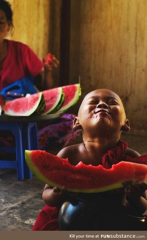 I wish I could be as happy as this kid is with watermelon