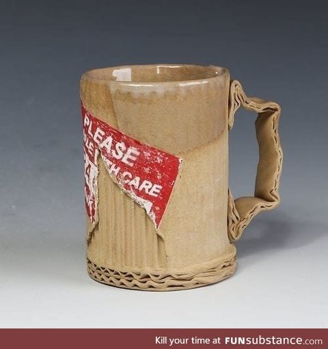 This ceramic coffee mug that looks like it's made of cardboard