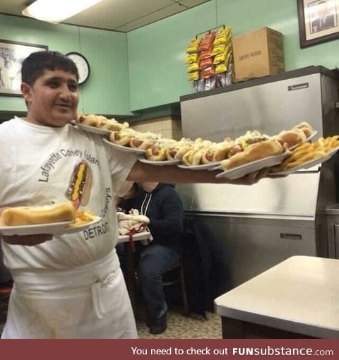 This guy is better at serving hot dogs than I will be at doing anything ever in my life