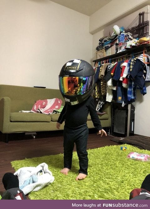 Kid found the helmet