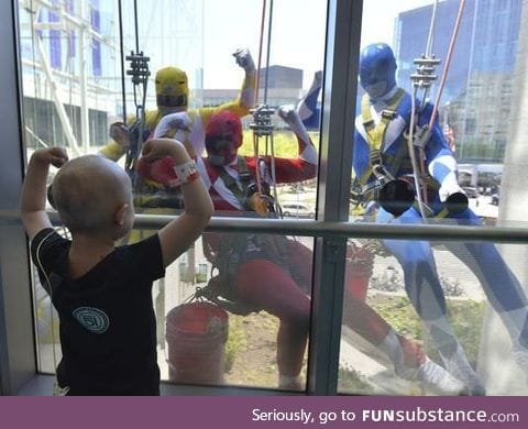 Power Ranger window washers surprise children at hospital