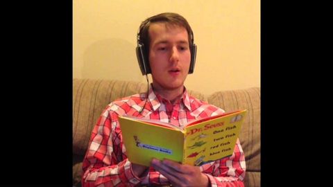 Reading a Dr. Seuss book while wearing a speech jammer