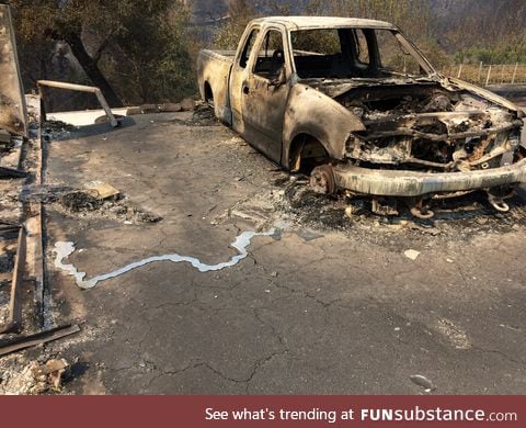 A pool of aluminum coming from a melted pickup truck after melting in Northern California